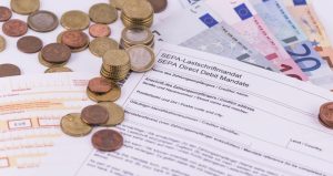 Прямий дебет у Німеччині: що це, ризики його використання та заходи безпеки для споживачів і продавців